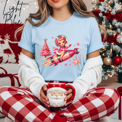 ✨🚀🎀 Retro Rocket Reindeer Girl Christmas Tee – Bella Canvas 3001 | Vintage Space Girl Holiday T-Shirt 💗🚀🎀