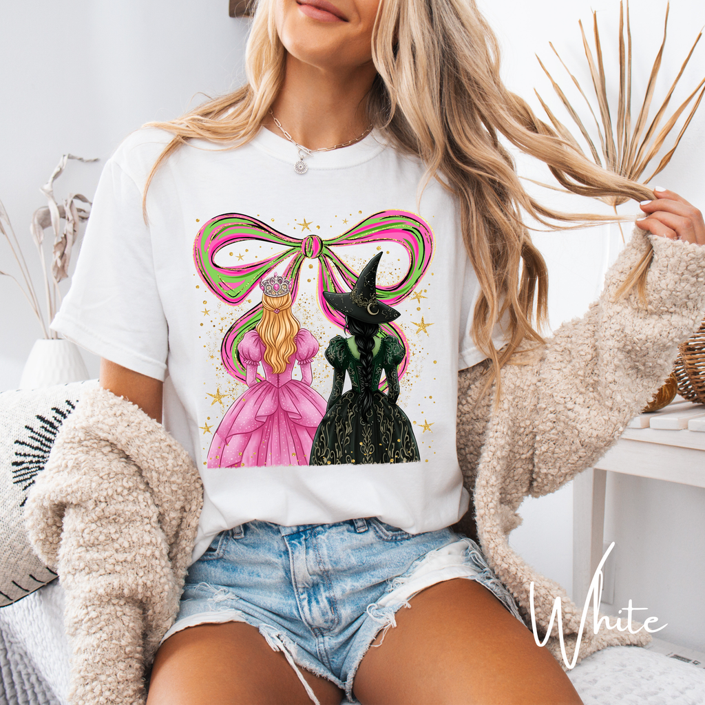 ✨ Wicked Besties Comfort Colors 1717 Tee 💚💗 | Sparkly Hand-Drawn Elphaba & Glinda with Coquette Bow 🎀🌙