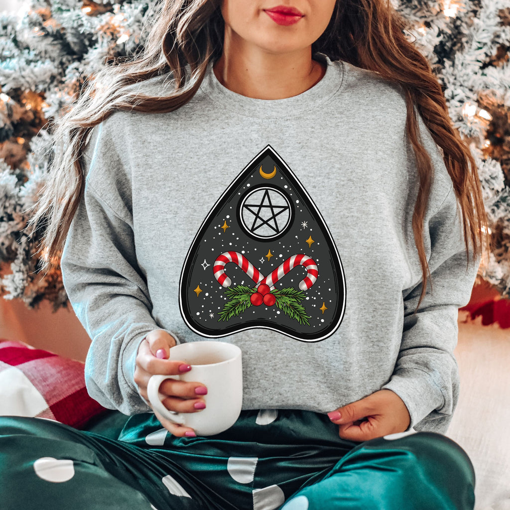 🔮🍬 Witchy Woman Christmas Sweatshirt – Candy Cane Ouija Planchette • Cute Magical Holiday Crewneck