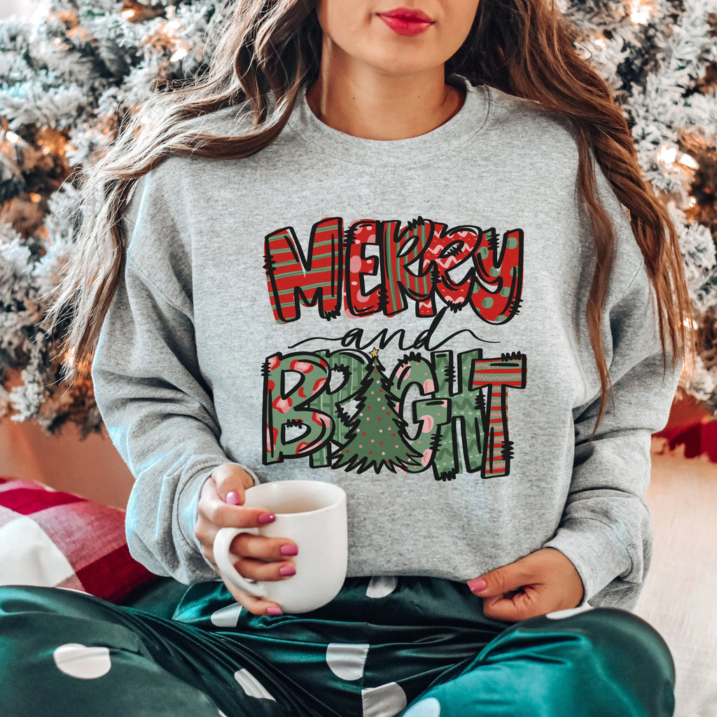 🎄✨ Merry & Bright Graffiti Print Sweatshirt – Bold Street-Style Christmas Crewneck • Modern Holiday Aesthetic