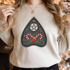 🔮🍬 Witchy Woman Christmas Sweatshirt – Candy Cane Ouija Planchette • Cute Magical Holiday Crewneck