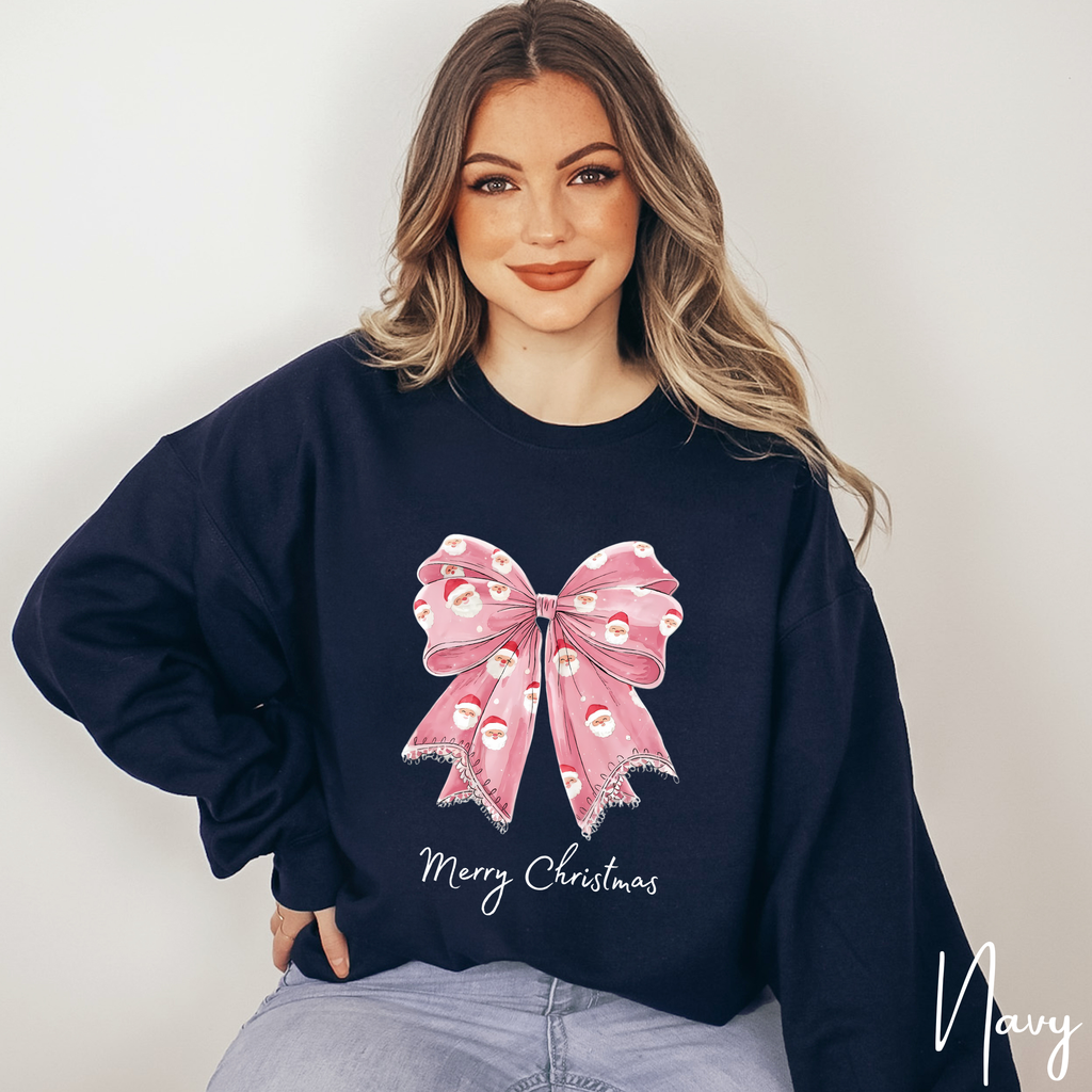 🎀🎅 Pink Coquette Bow Christmas Sweatshirt – Gildan 18000 Cozy Holiday Crewneck with Santa Bow Design • Soft Girly Festive Aesthetic